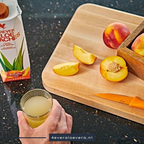 Laat de Frisheid van Zongerijpte Perziken je Dag Verlichten met Forever Aloe Peaches Drank!